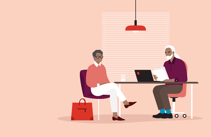 Illustration of a taxpayer sitting at a table meeting with a Tax-Aide volunteer